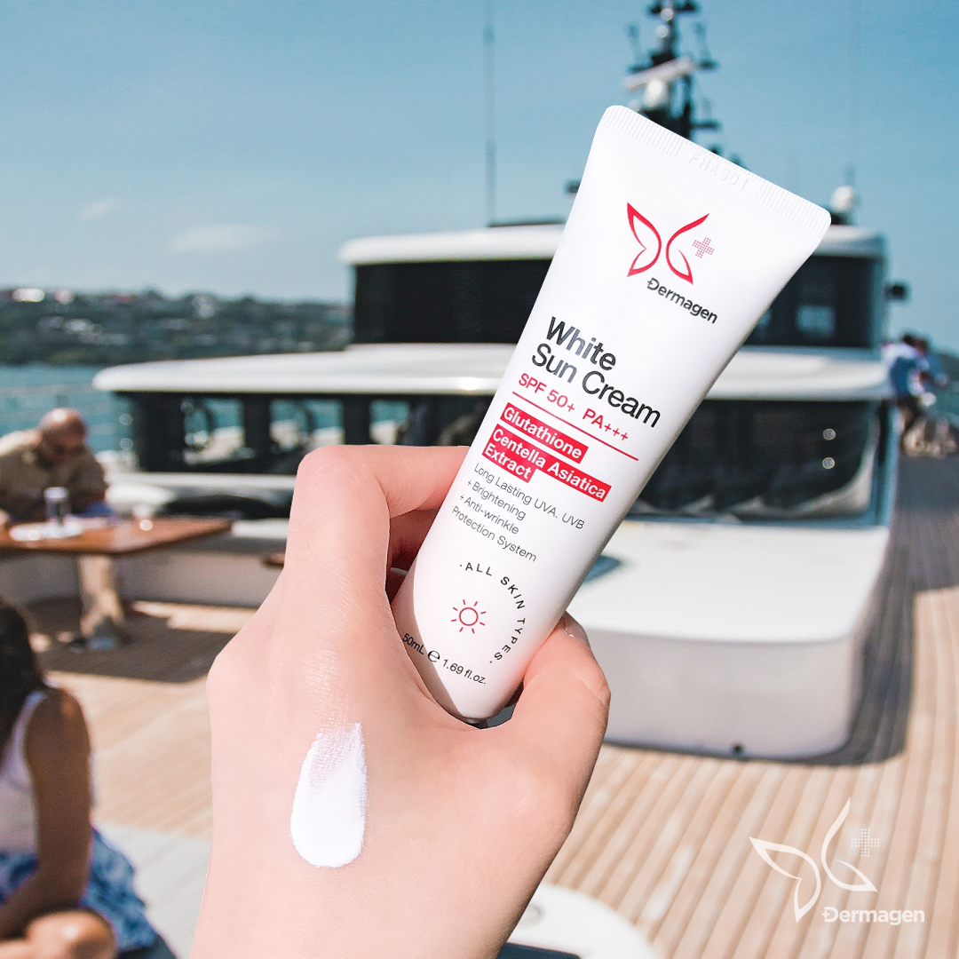 Dermagen White Sun Cream applied to the hand showing the cream texture